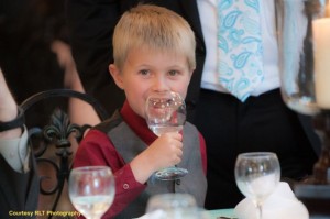 Boy enjoying drink from Ivy House goblet, included in base price.
